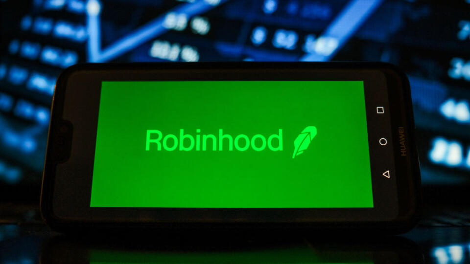 In this photo illustration a Robinhood logo seen displayed