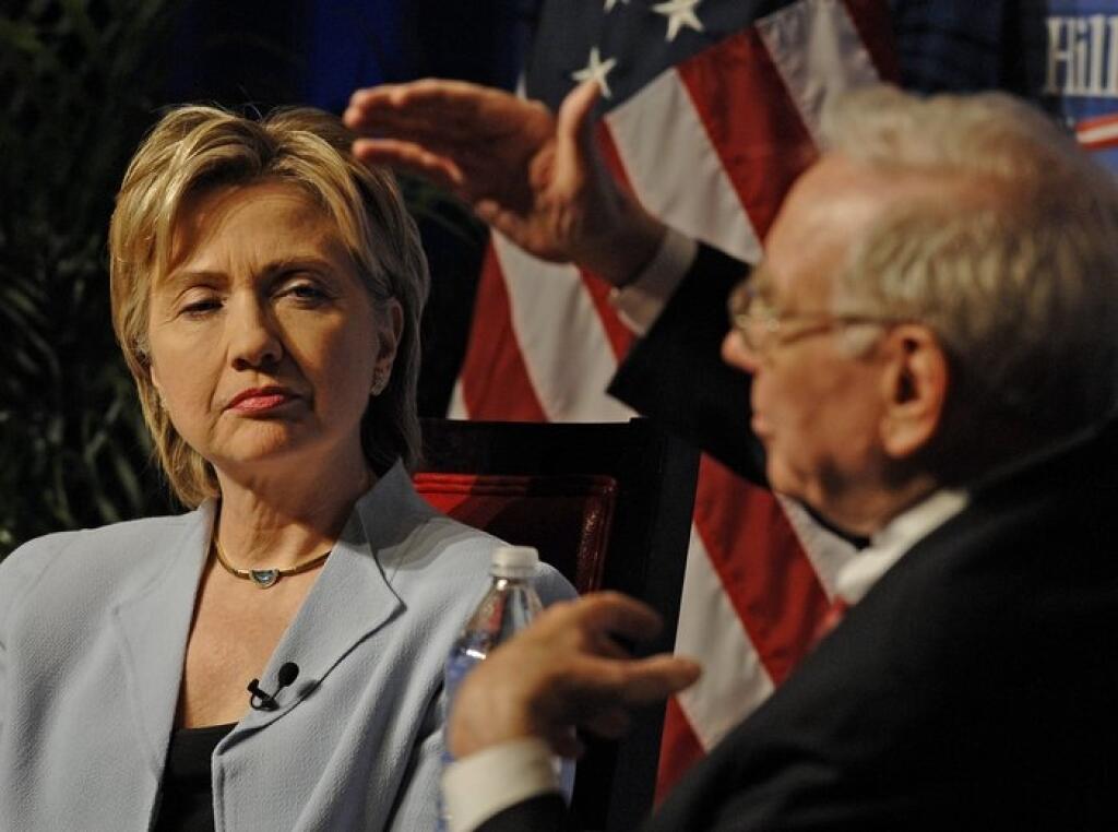 Sen. Hillary Rodham Clinton D-N.Y., listens as billionaire investor Warren Buffett speaks at a  fundraiser to support her presidential bid, Tuesday, June 26, 2007, in New York. (AP Photo/ Louis Lanzano)  .