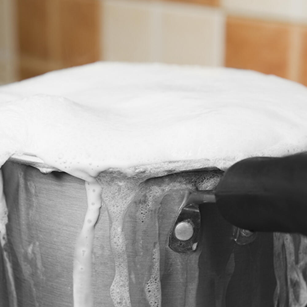 Milk,Boiling,Over,A,Pan