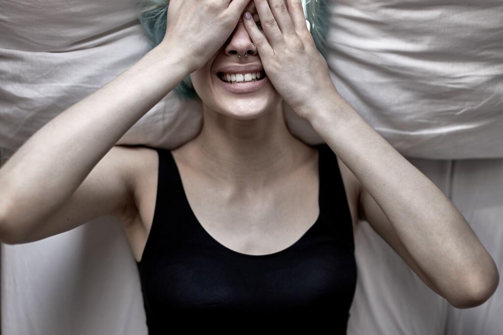 Upset,Depressed,Female,Is,Crying,In,Tears,Lying,On,Bed