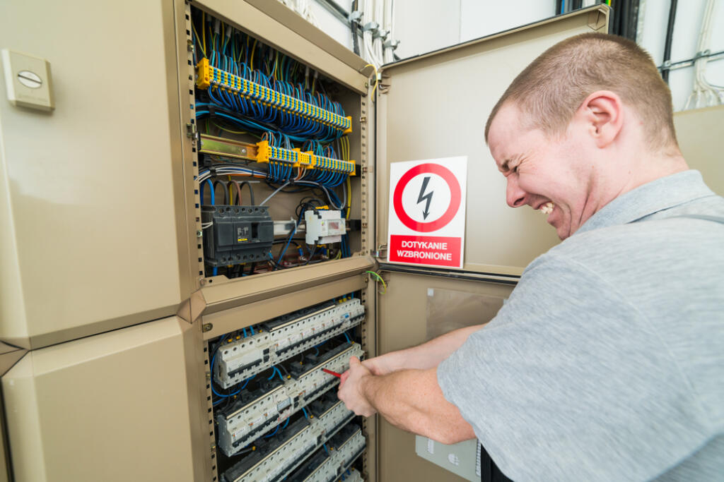 Electrician,Electrocuted.,Grimace,Of,Pain,On,His,Face