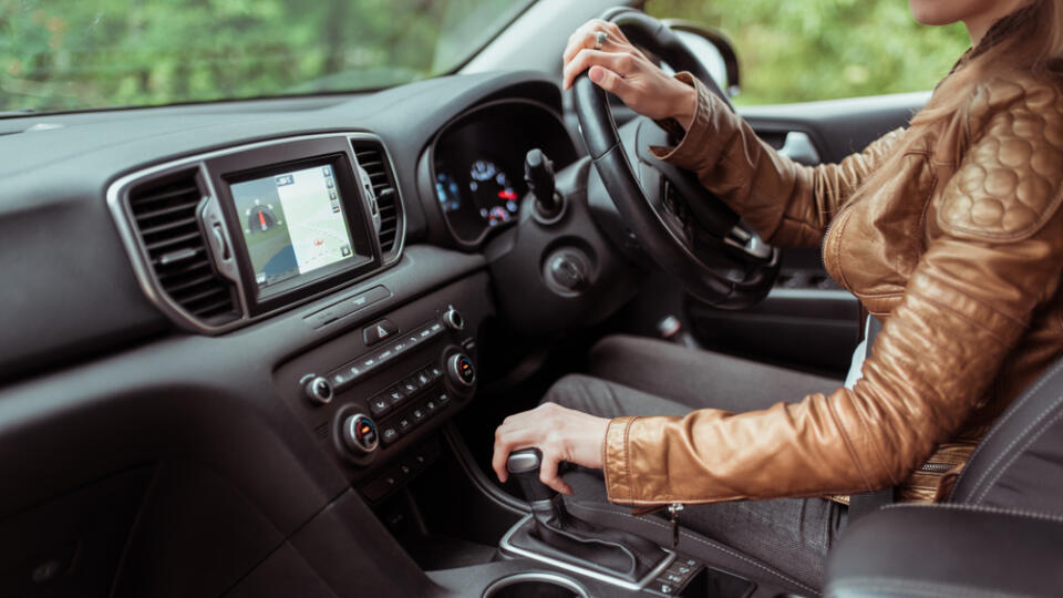 Close-up,,Woman,Driving,A,Car,Includes,A,Gearbox,,Reversing,,Starting