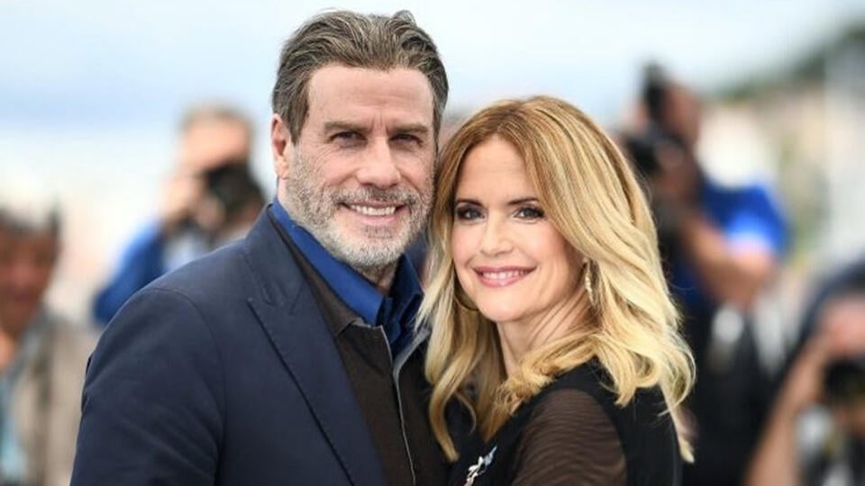 John Travolta (67)  s manželkou Kelly Preston (†57).