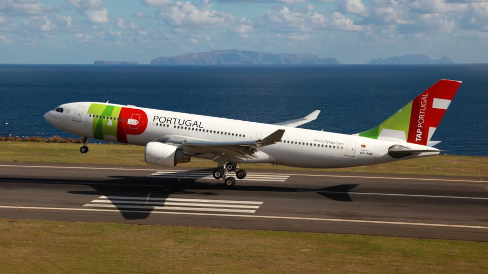 MADEIRA, PORTUGAL - FEBRUARY 26, 2012: A TAP Airbus A330 on final approach on February 26, 2012 in Madeira, Portugal. TAP is Portugal's flag carrier with 55 planes and 9.75 million passengers in 2011.