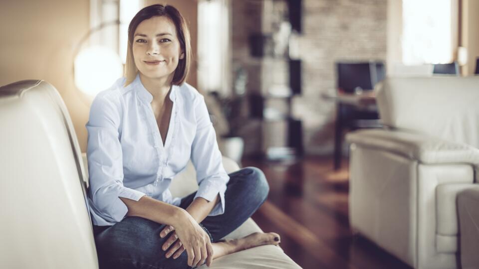 Beautiful young woman at home