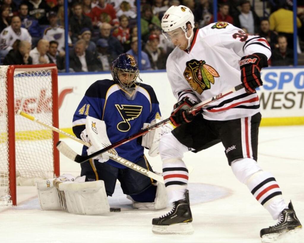 Chicago Blackhawks' Jimmy Hayes (39) looks for the rebound in front of St. Louis Blues goalie Jaroslav Halak (41),of Slovakia, in the first period of an NHL hockey game, Tuesday, March 6, 2012 in St. Louis.(AP Photo/Tom Gannam)