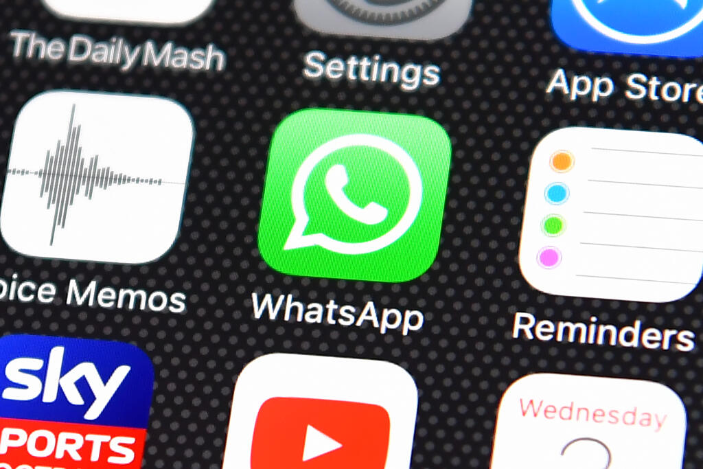 LONDON, ENGLAND - AUGUST 03: The Whatsapp app logo is displayed on an iPhone on August 3, 2016 in London, England.  (Photo by Carl Court/Getty Images)