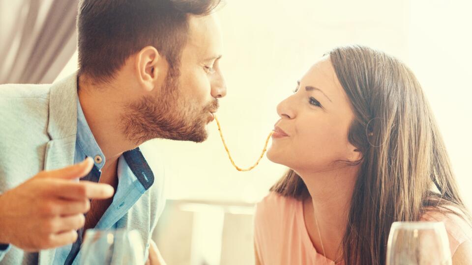 Happy Couple Eating Spaghetti