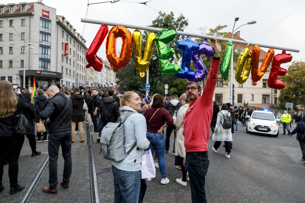 Picture from the march to condemn the hatred towards the LGBTI community in Bratislava on October 14, 2022. The procession from Zámocká Street to Námestí SNP for the victims of the tragedy was organized by the Initiative Inakosť and Rainbow Pride Bratislava.  TASR PHOTO - Dano Veselský