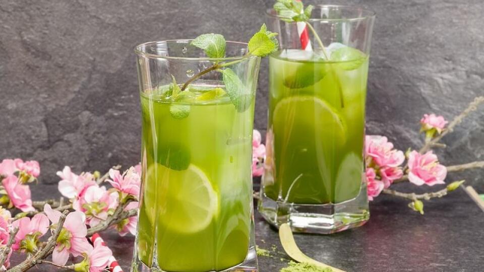 Healthy Iced Matcha Tea with lime, ginger and mint. Macro, selective focus