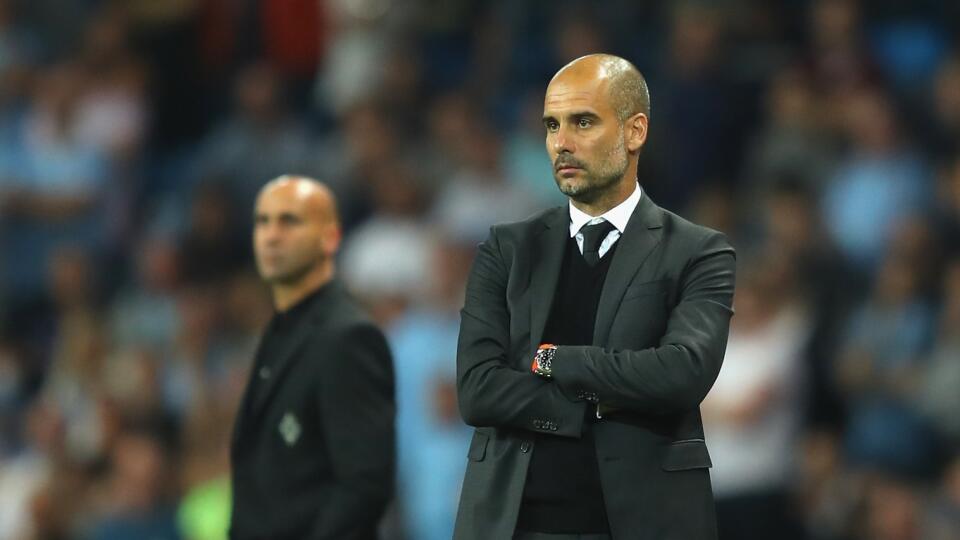 MANCHESTER, ENGLAND - SEPTEMBER 14:  Andre Schubert head coach of Borussia Moenchengladbach and Josep Guardiola manager of Manchester City look on from the touchline during the UEFA Champions League match between Manchester City FC and VfL Borussia Moenchengladbach at Etihad Stadium on September 14, 2016 in Manchester, England.  (Photo by Richard Heathcote/Getty Images)