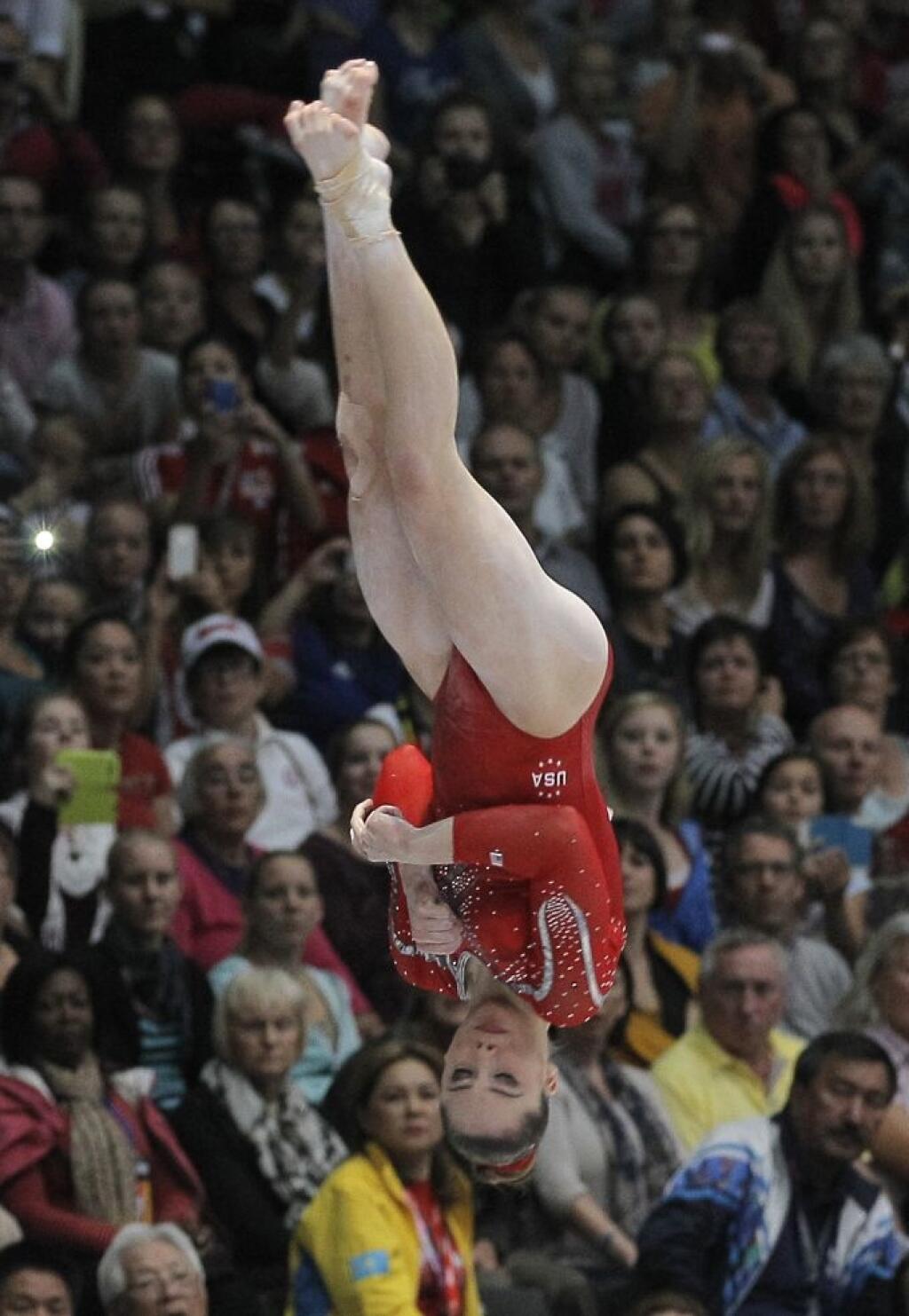 McKayla Maroney from the U.S. performs on the vault, during the qualification round at the artistic gymnastics World Championships in Antwerp, Belgium, Wednesday, Oct. 2, 2013. The event takes place until Sunday, Oct. 6. (AP Photo/Yves Logghe)
