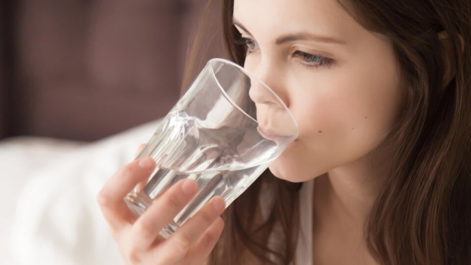 Attractive,Young,Dehydrated,Woman,Feeling,Thirsty,,Holding,Glass,And,Drinking