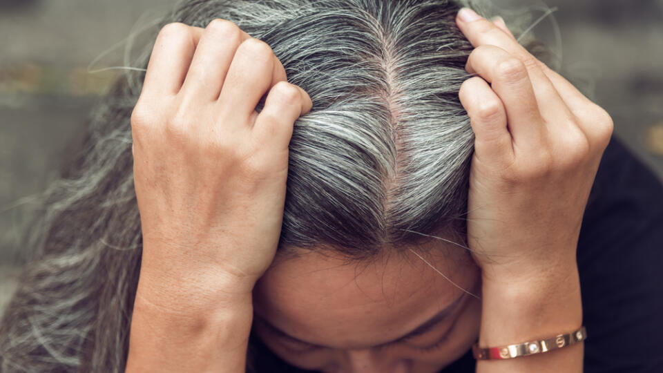 Closeup,Sad,Asian,Young,Beautiful,Woman,And,Gray,Hair,With