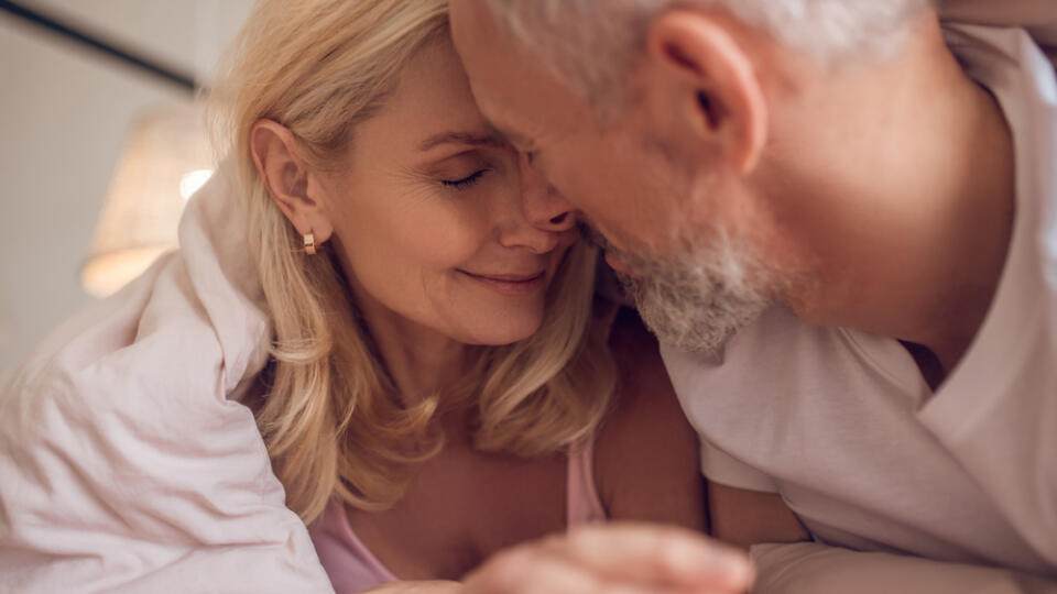 Happy,Morning.,Middle-aged,Couple,Having,Romantic,Moment,In,Bedroom