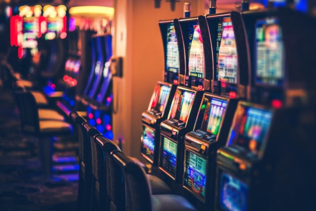 Rows,Of,Casino,Slot,Machines,With,Shallow,Depth,Of,Field.
