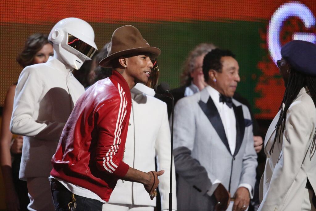 Pharrell Williams (druhý zľava) a Daft Punk.