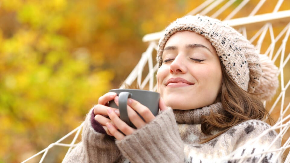 Relaxed,Woman,Smelling,Coffee,Lying,On,Hammock,In,Autumn,Holidays