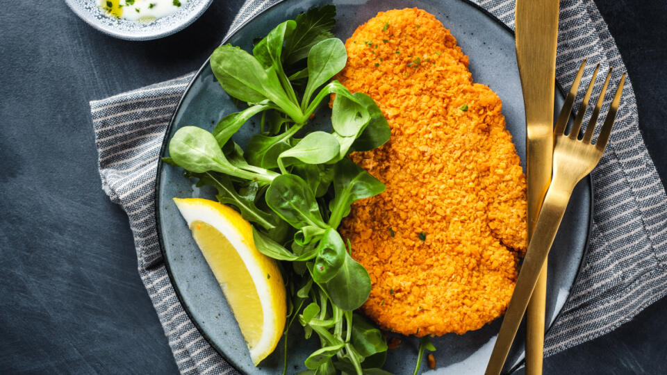 Classic,German,Or,Austrian,Schnitzel,With,Salad,Served,On,Plate.