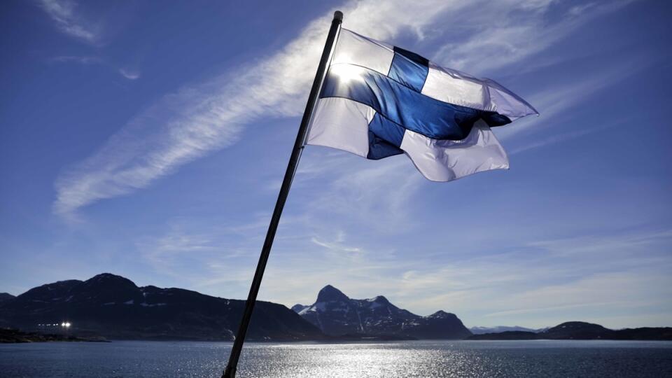 The flag of Finland flies aboard the Finnish icebreaker MSV Nordica as it arrives into Nuuk, Greenland, after traversing the Northwest Passage through the Canadian Arctic Archipelago, Saturday, July 29, 2017. After 24 days at sea and a journey spanning more than 10,000 kilometers (6,214 miles), the MSV Nordica has set a new record for the earliest transit of the fabled Northwest Passage. The once-forbidding route through the Arctic, linking the Pacific and the Atlantic oceans, has been opening u