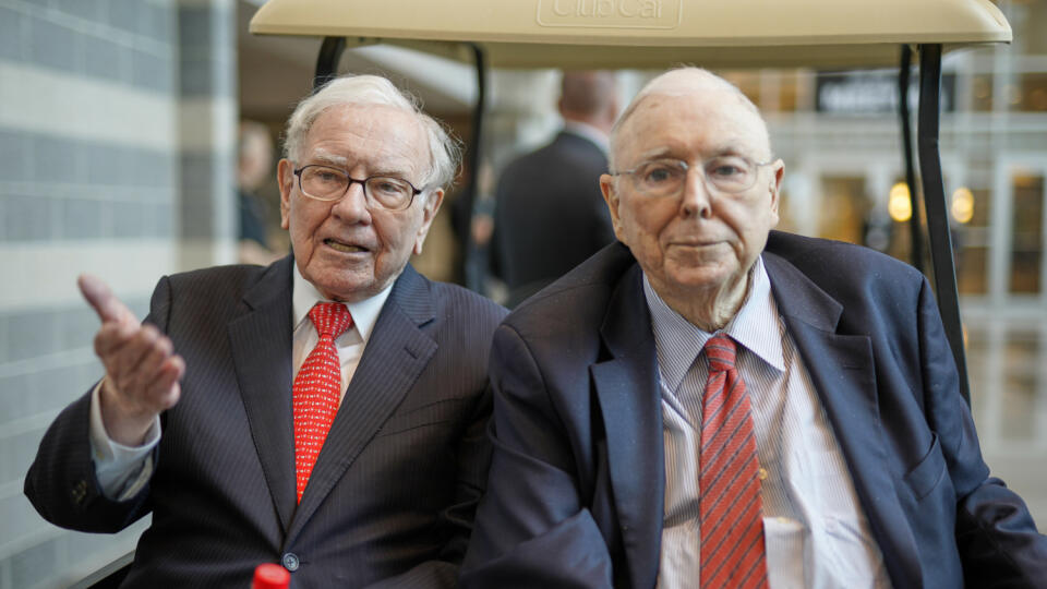Berkshire Hathaway Chairman and CEO Warren Buffett, left, and Vice Chairman Charlie Munger, briefly chat with reporters Friday, May 3, 2019, one day before Berkshire Hathaway's annual shareholders meeting. An estimated 40,000 people are expected in town for the event, where Buffett and Munger preside over the meeting and spend hours answering questions. (AP Photo/Nati Harnik)