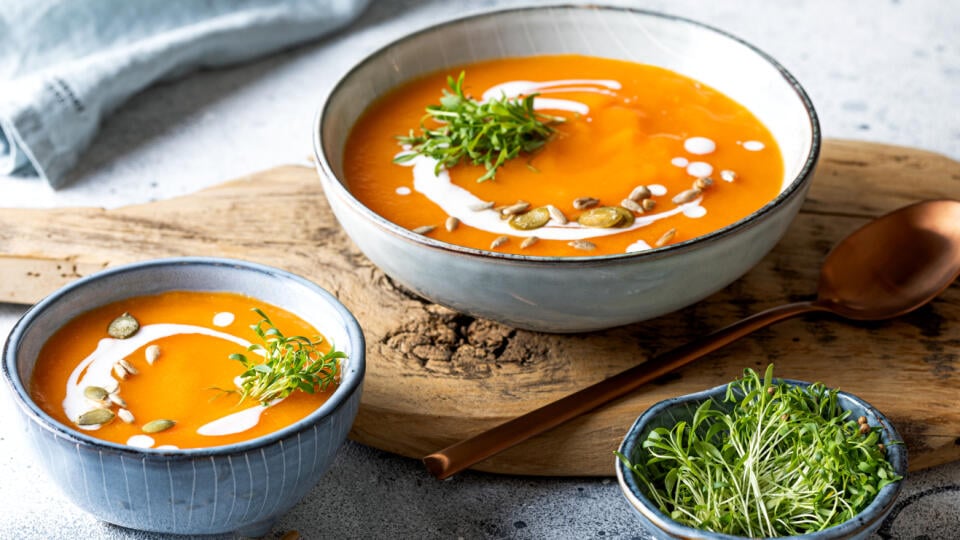 Vegetarian,Autumn,Pumpkin,And,Carrot,Soup,With,Cream,,Seeds,And