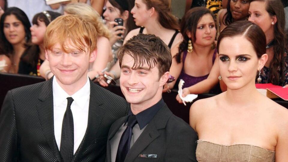 Rupert Grint s hereckými kolegami Danielom Radcliffeom a Emmou Watson