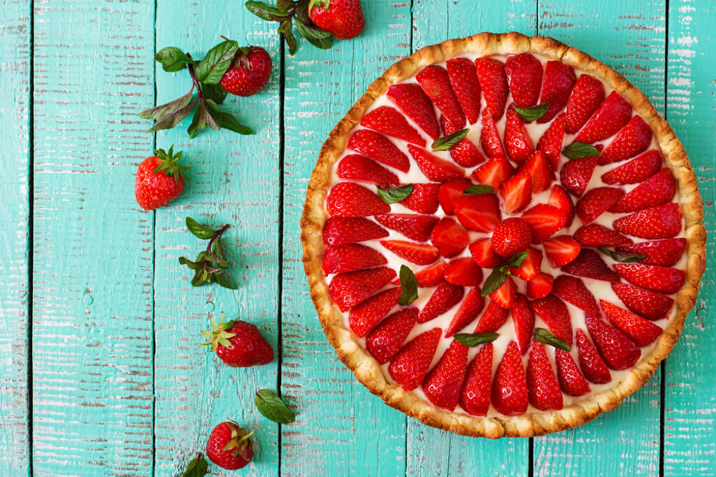 Tart,With,Strawberries,And,Whipped,Cream,Decorated,With,Mint,Leaves.