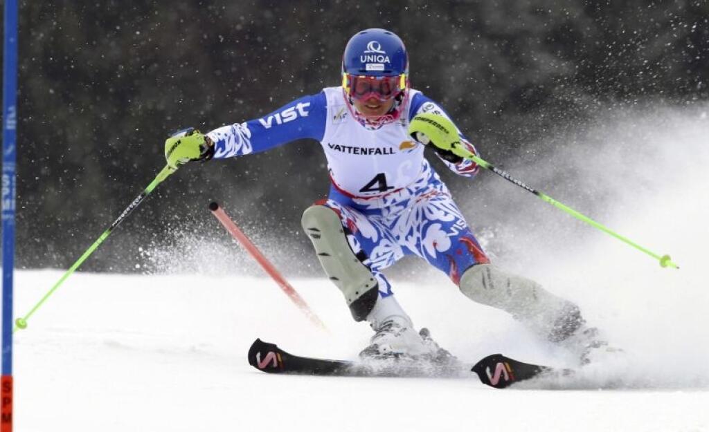 Slovakia's Veronika Zuzulova Velez clears a gate during the first run of the women's slalom, at the Alpine skiing world championships in Schladming, Austria, Saturday, Feb.16, 2013. (AP Photo/Alessandro Trovati)