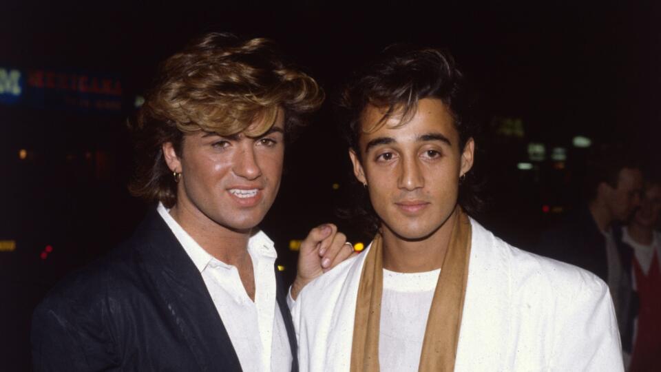 1984: British singer songwriter George Michael, lead singer of the pop group Wham!, with the group's guitarist Andrew Ridgeley at the film premiere of the hit 'Dune'. (Photo by Hulton Archive/Getty Images)
