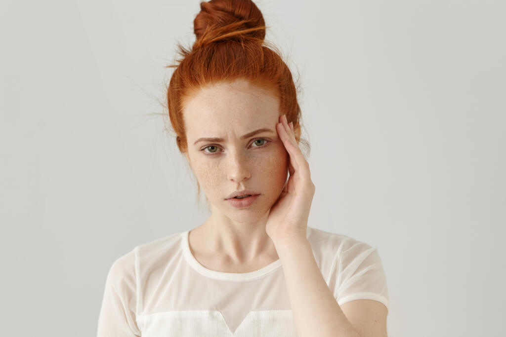Headshot,Of,Unhappy,Young,Red-haired,Female,Having,Frustrated,And,Painful