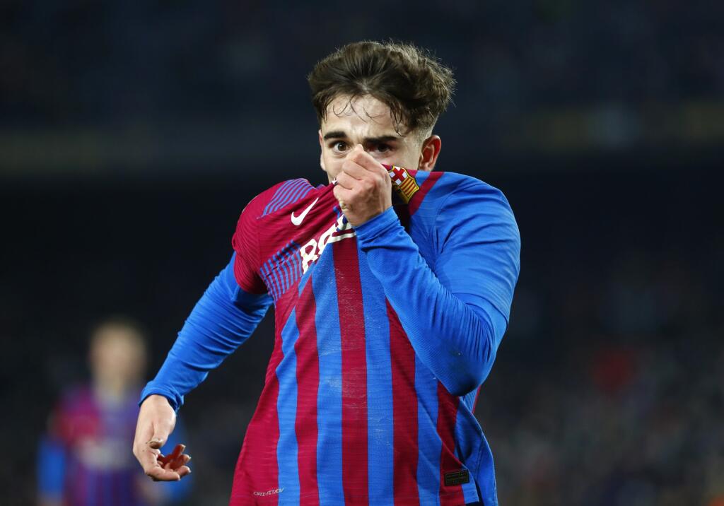 KK82 Barcelona - Na snímke futbalista Barcelony Gavi sa teší z gólu počas zápasu 18. kola španielskej La Ligy FC Barcelona - FC Elche 18. decembra 2021 v Barcelone. FOTO TASR/AP
Barcelona's Gavi celebrates after scoring his side's second goal during the Spanish La Liga soccer match between Barcelona and Elche at the Camp Nou stadium, in Barcelona, Spain, Saturday, Dec. 18, 2021. (AP Photo/Joan Monfort)