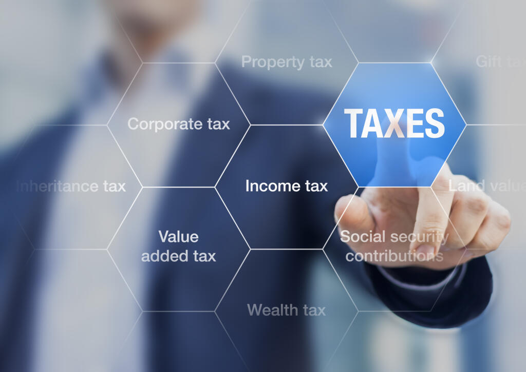 Businessman,Showing,Concept,Of,Taxes,Paid,By,Individuals,And,Corporations
