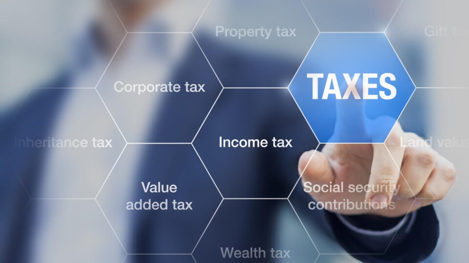 Businessman,Showing,Concept,Of,Taxes,Paid,By,Individuals,And,Corporations