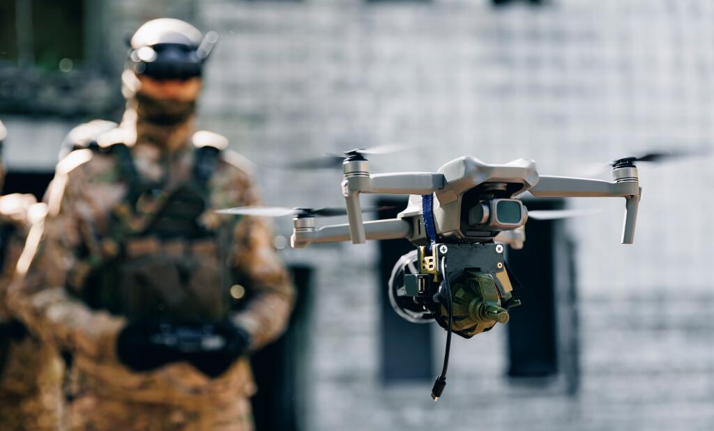 Soldier,Uav,Operator,Launches,Army,Drone,With,Bomb,To,Drop
