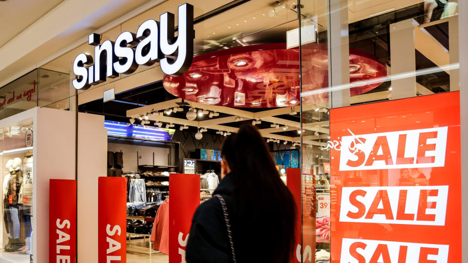 A shopper walks in front of Sinsay shop in Krakow Gallery