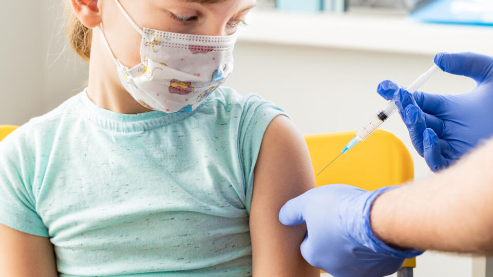 Little,Girl,In,Face,Mask,In,Doctor's,Office,Is,Vaccinated.