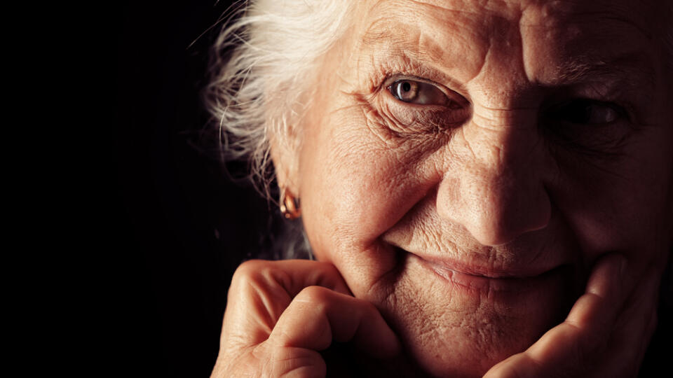 Portrait,Of,A,Happy,Senior,Woman,Smiling,At,The,Camera.