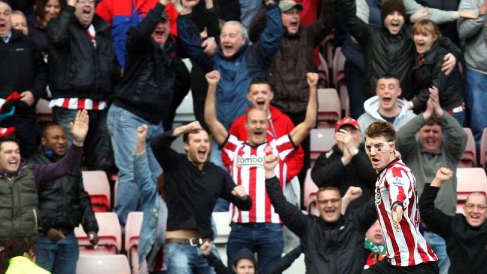 Sunderland's Nicklas Bendtner, celebrates his goal against Liverpool during their English Premier League soccer match at the Stadium of Light, Sunderland, England, Saturday, March 10, 2012. (AP Photo/Scott Heppell)