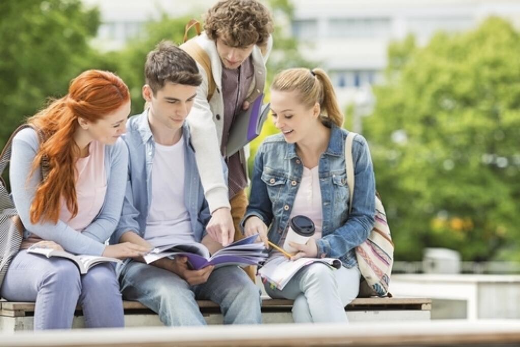 Group,Of,Friends,Studying,Together,At,University,Campus
