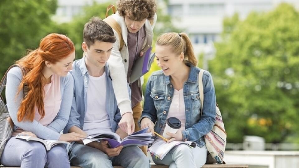 Group,Of,Friends,Studying,Together,At,University,Campus