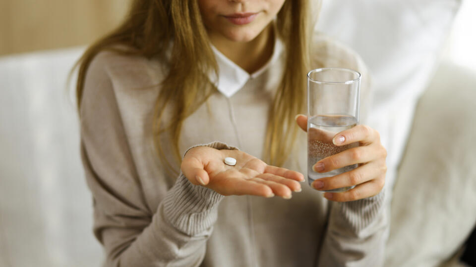 Close-up,Woman,Holding,Pills,Time,To,Take,Medications,,Cure,For