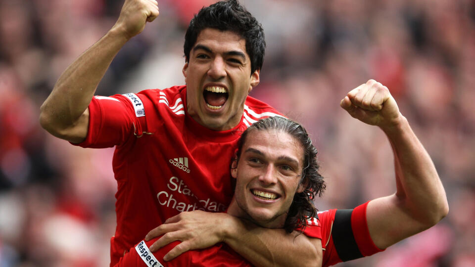 Andy Carroll a Luis Suarez.