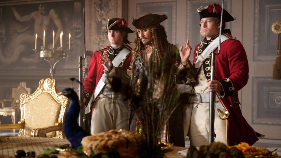 "PIRATES OF THE CARIBBEAN: ON STRANGER TIDES"

A prisoner in St. James Palace, Captain Jack Sparrow (JOHNNY DEPP) tries to make himself scarce when Barbossa (Geoffrey Rush), now a privateer in service to the British Crown, enters the hall.

Ph: Peter Mountain

©Disney Enterprises, Inc. All Rights Reserved.