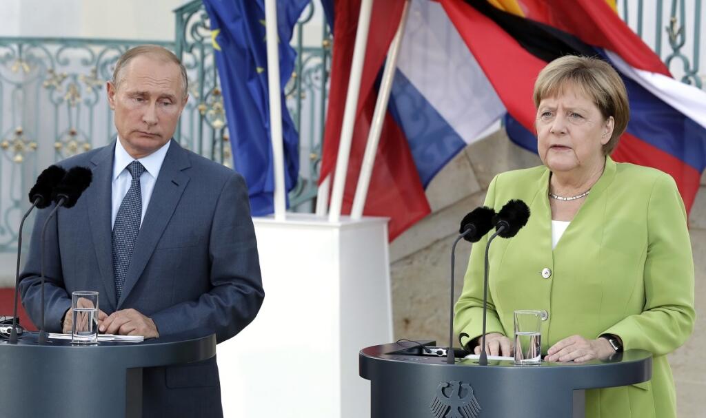 Putin a Merkelová spolu rokujú