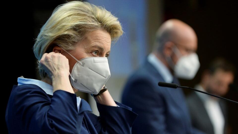 European Commission President Ursula von der Leyen, left, and European Council President Charles Michel, center, prepare to address a media conference at the end of an EU summit in Brussels