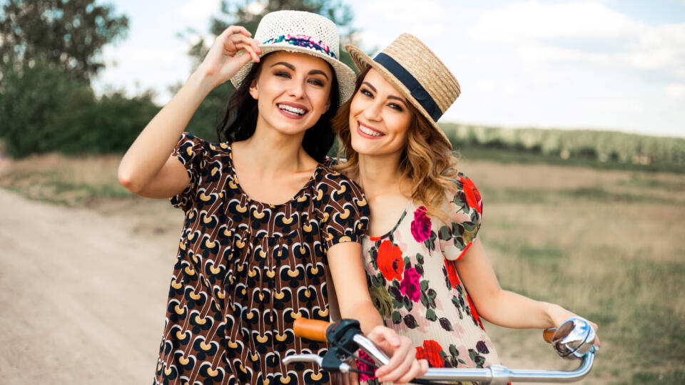 Two,Country,Stylish,Hipster,Girls,In,Dresses,And,Straw,Hats,