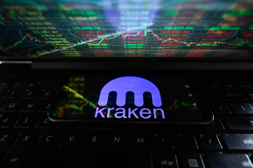 In this photo illustration a Kraken logo seen displayed on a