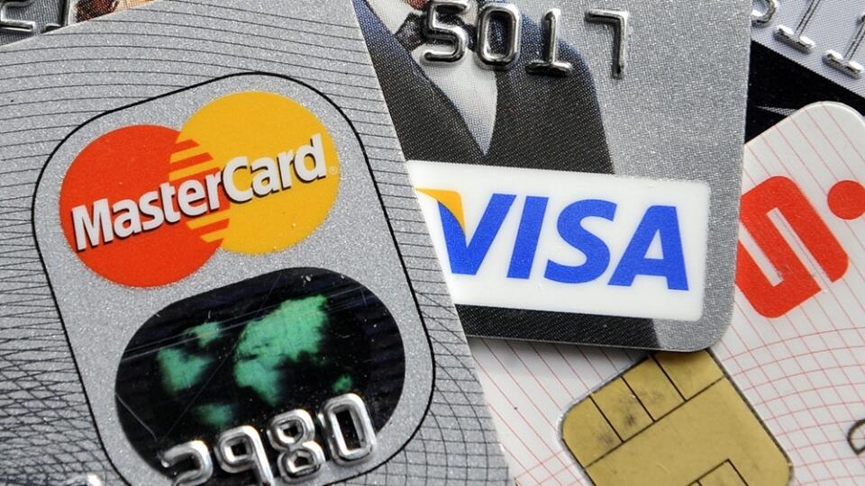 FILE - This Nov. 18, 2009 file photo shows credit and bank cards with electronic chips in Gelsenkirchen, Germany. In the wake of recent high-profile data breaches, including this week’s revelation that hackers stole consumer data from eBay’s computer systems, Visa and MasterCard are renewing a push to speed the adoption of microchips into U.S. credit and debit cards. (AP Photo/Martin Meissner, File)