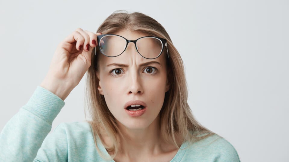 Surprised,Young,Female,Model,With,Long,Blonde,Hair,,Wears,Glasses